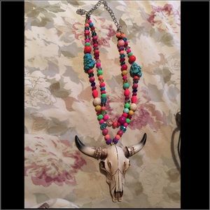 Long horn multi color beaded necklace .