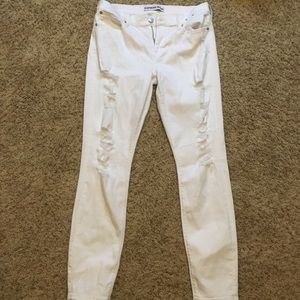 Express white distressed mid rise skinny jeans