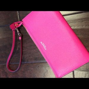 Coach hot pink wristlet - Note stain/color bleed