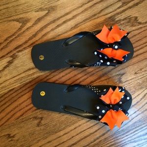 Orange/Navy bow flip flops