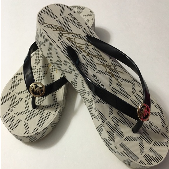 !!SOLD !! Michael Kors flip flops . !! S O L D !!