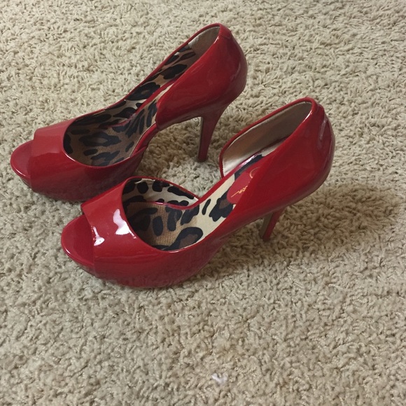 Jessica Simpson red pumps