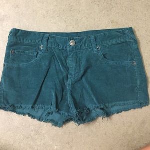 Forest green corduroy fringe shorts
