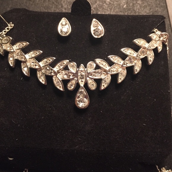 Silver Necklace, bracelet, and earring set