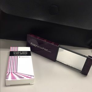 Double sided mirror. Portable. 5X magnification.