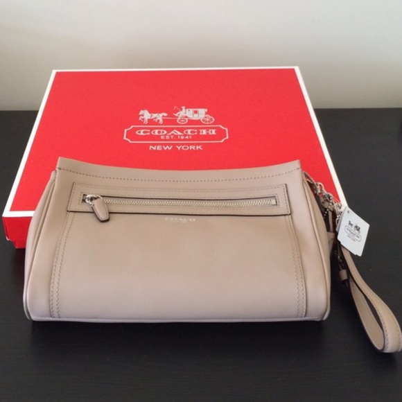 Coach Handbags - Coach Legacy large leather clutch in tan