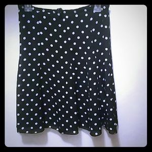 Black skirt with white polka dots