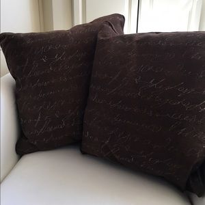 Brown with White Lettering Pillows