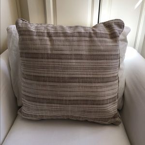 Beige and cream striped pillows