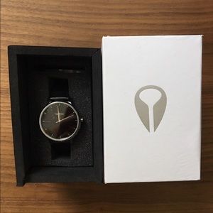 Silver and black Nixon watch.