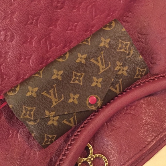 Guaranteed authentic Josephine wallet.