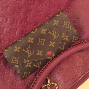 Guaranteed authentic Josephine wallet.