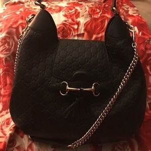 Guaranteed authentic Emily Gucci bag.