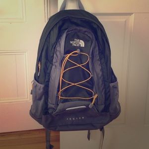 Green and gray North Face Jester backpack