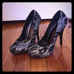 Never worn lacey high heel shoes.