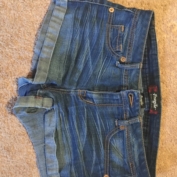 Fragile jean shorts