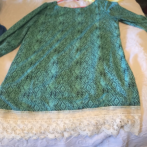 Long tunic top with zip up back.