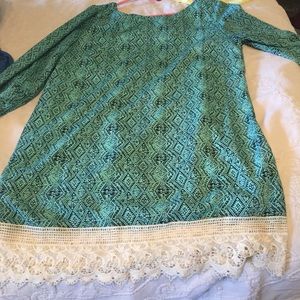 Long tunic top with zip up back.