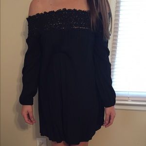 Off the shoulder black lace long sleeved dress