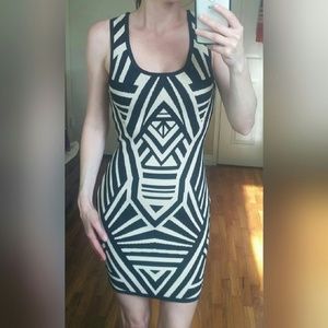 Patterned body con sweater dress