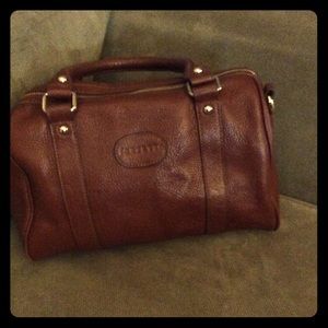Terzetto handbag in a beautiful caramel color.