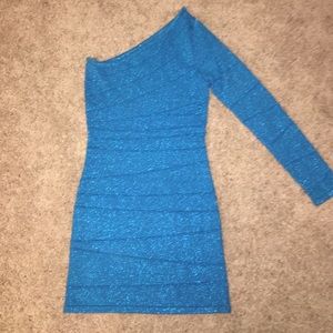 Wow couture one long sleeved dress.  Blue sparkly