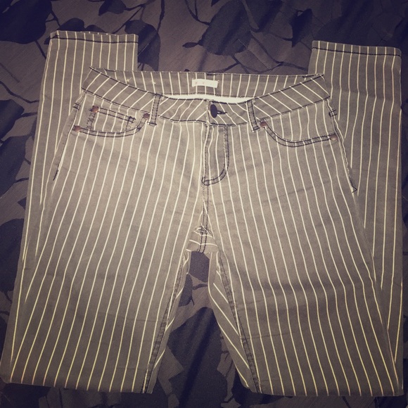 Grayish, white stripe skinnies