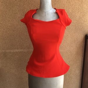 Orange, peplum top