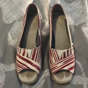 Red and cream tom's wedges