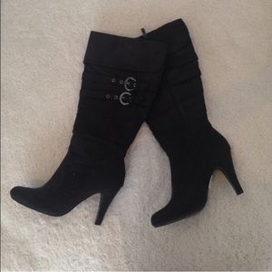 Black heeled over the knee boots
