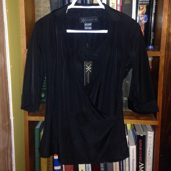 Kardashian Kim. Collared wrap blouse.  Xsmall size