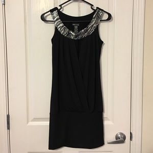 Never worn, black mini dress, very cute