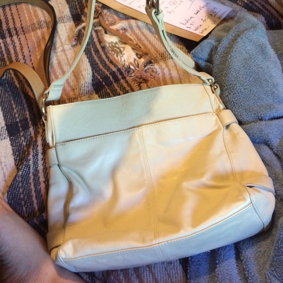 Cute beige purse.