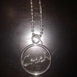 Coach silver keychain.