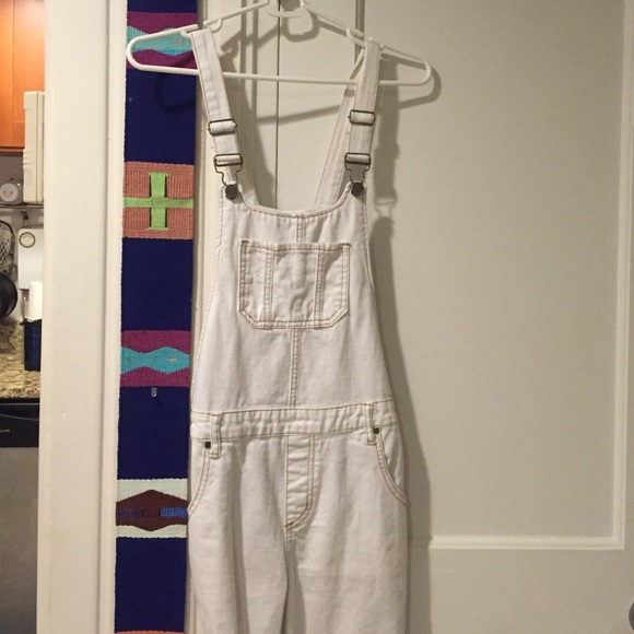 Distressed white denim overall