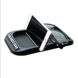 Universal cell phone dashboard stand holder