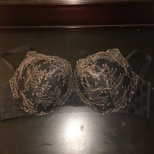 Beautiful black and gold add 2 cups size bra!