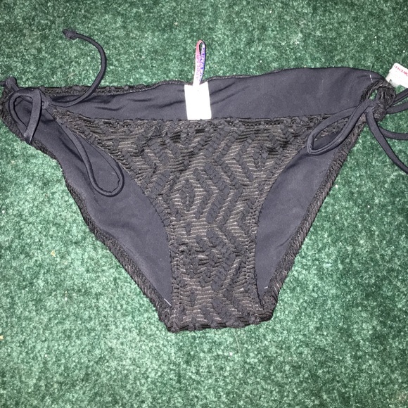 Small black bikini bottoms, never worn, with tags
