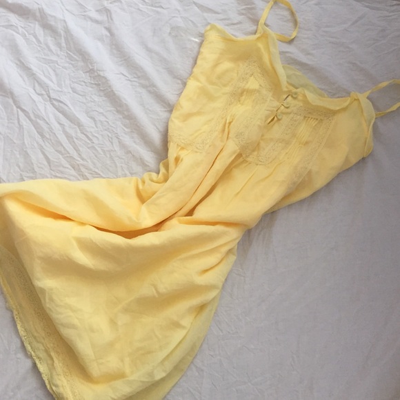 Pastel yellow boho sundress with pink beaded sash