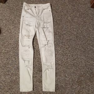 WHITE HIGH WAISTED CUT OUT JEANS