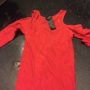 Red tight dress. Hugs body