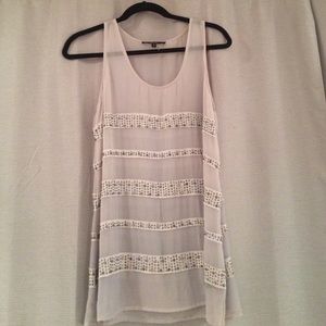 Sheer beaded tunic.