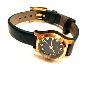 Teal leather band with gold framed face watch