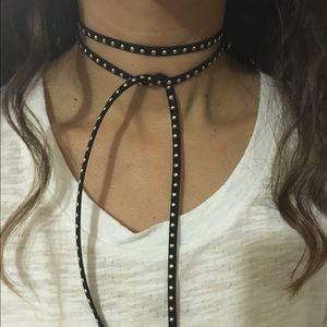 Studded choker necklace.