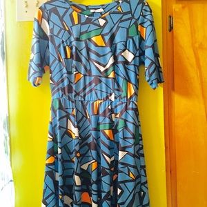 Flattering, flirty, stretchy fit-and-flare poly