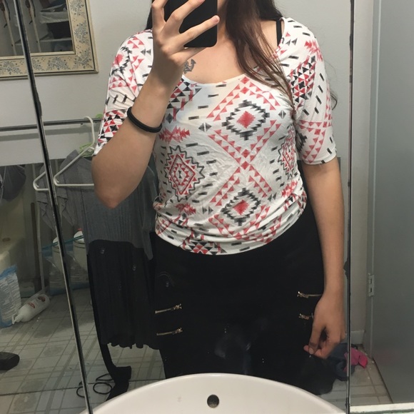 Black, white and red shirt.