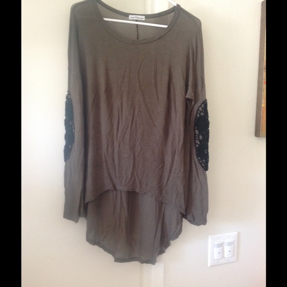 Brown top with crochet on elbows
