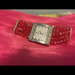 Elegant red crystal like beaded watch