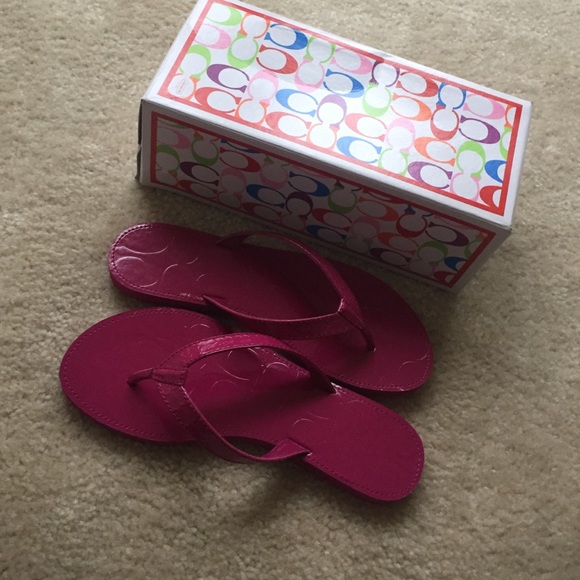 Brand new, never worn Coach flip flops size 7