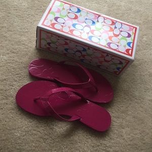 Brand new, never worn Coach flip flops size 7